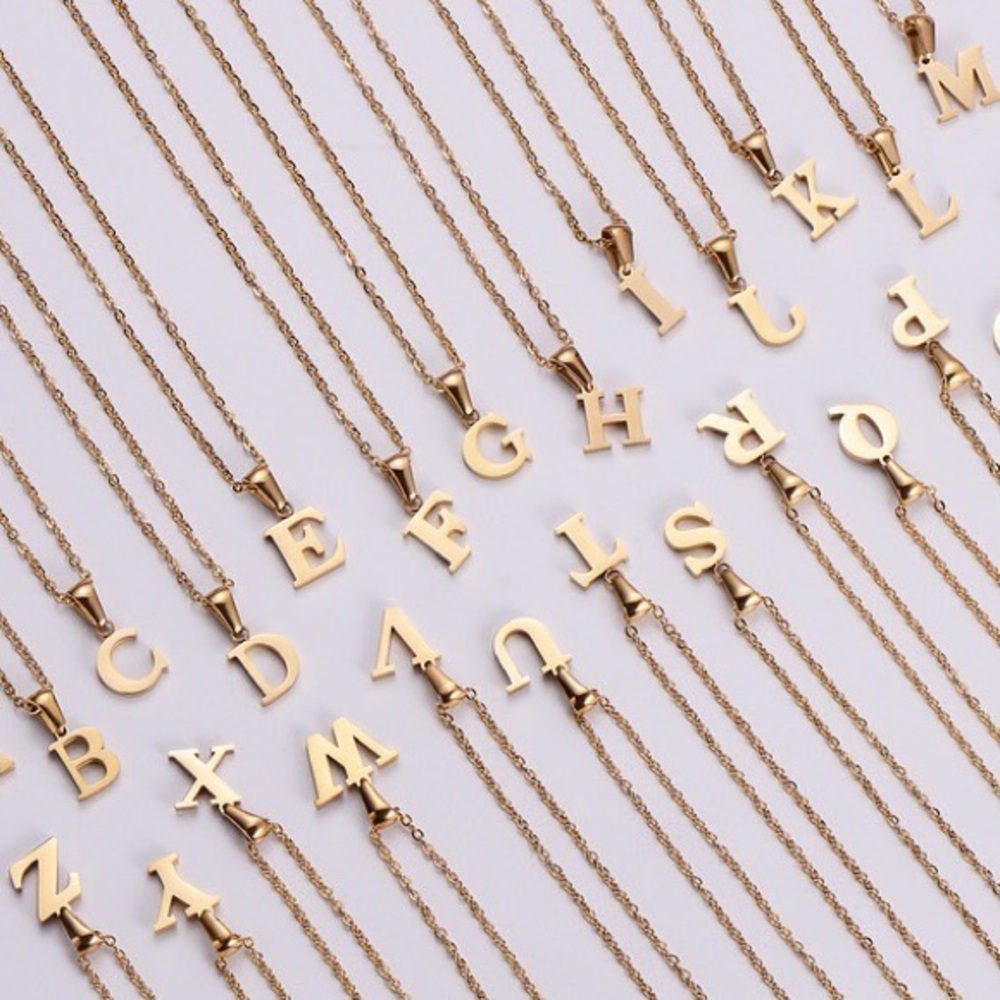 Gold stainless steel letter chain.
